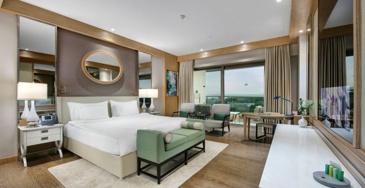 Regnum Carya Jade Room Спальня с частичным видом на море